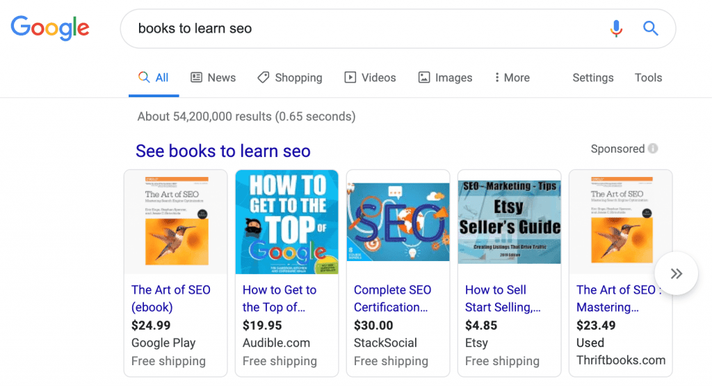 Google search results for 'books to learn SEO' featuring shopping listings with sponsored products. The results include book titles, prices, and shipping information, such as 'The Art of SEO' and 'How to Get to the Top of Google.' The listings demonstrate the use of product schema for eCommerce websites.
